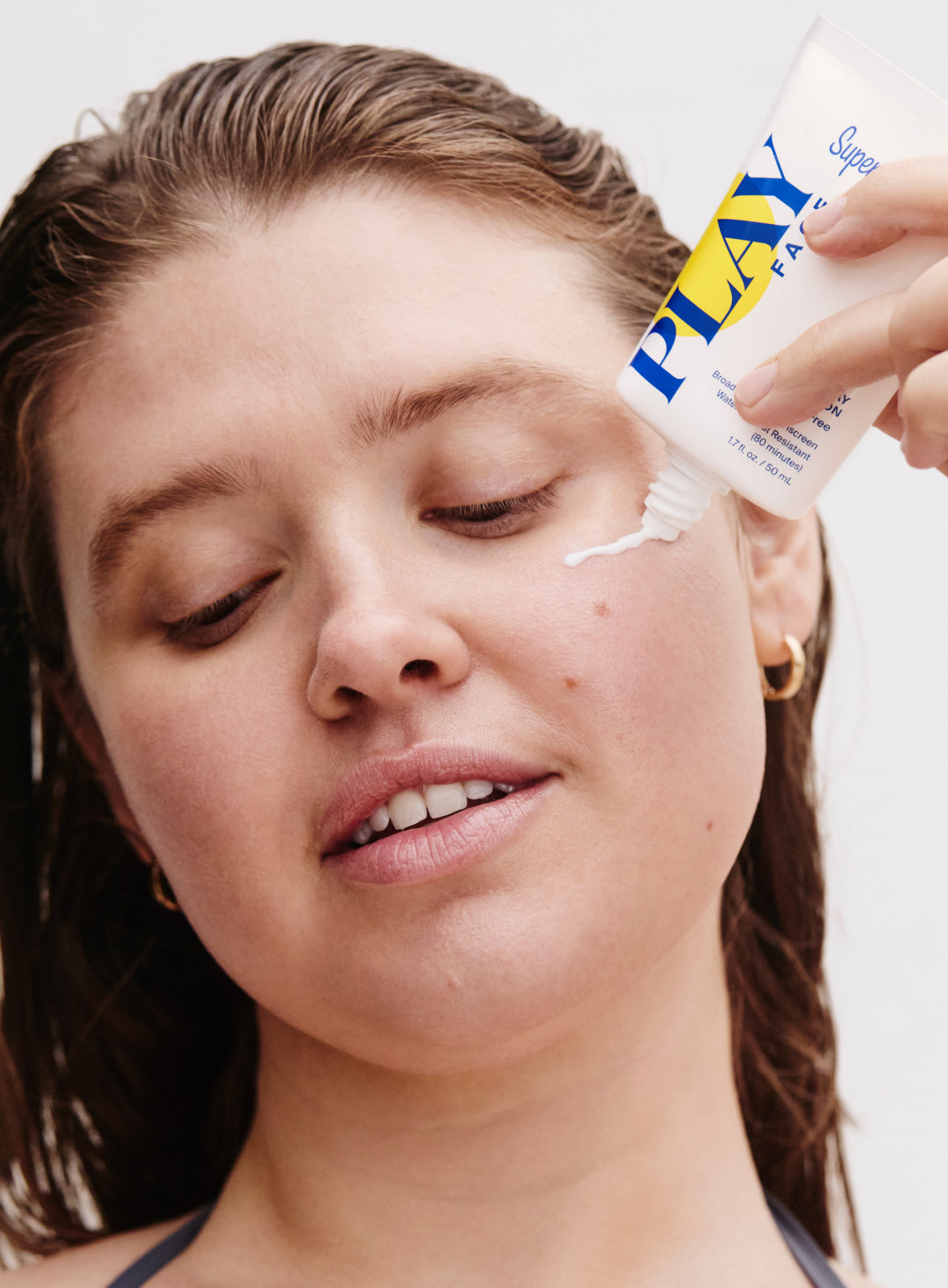 supergoop-play-face-lotion-spf-50-model-application_da25fd68-20df-4642-b45c-a42604d4bc93.jpg